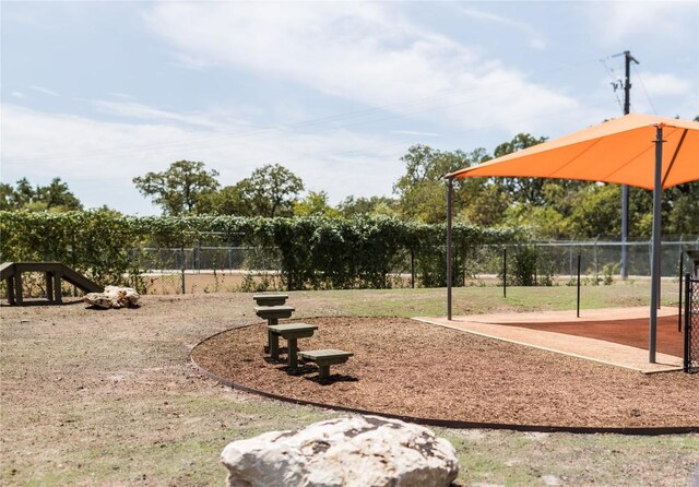 232 Flora Springs Cv, Liberty Hill, TX 78642 - view of property's community featuring fence