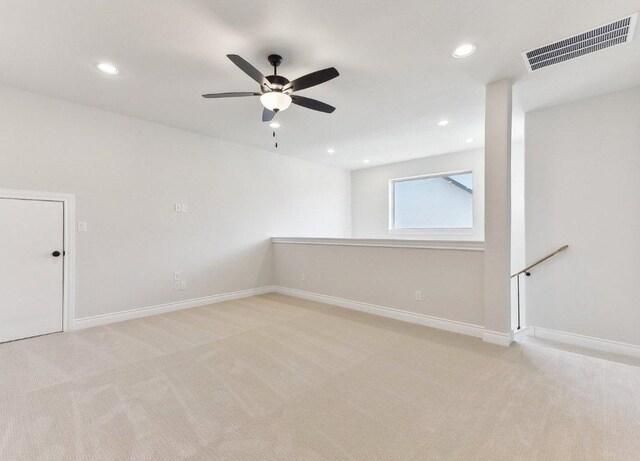 232 Flora Springs Cv, Liberty Hill, TX 78642 - empty room with visible vents, ceiling fan, recessed lighting, and light carpet