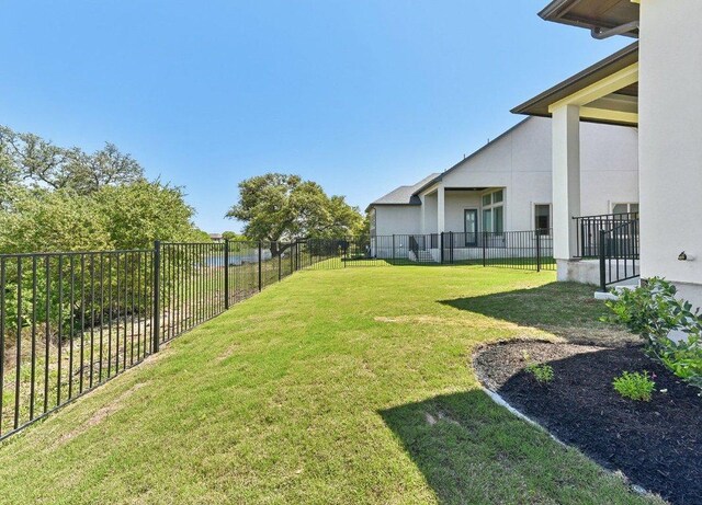 232 Flora Springs Cv, Liberty Hill, TX 78642 - view of yard featuring a fenced backyard