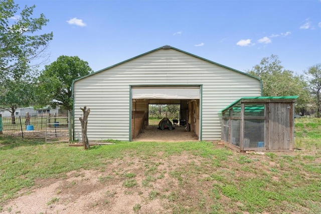 garage featuring a lawn