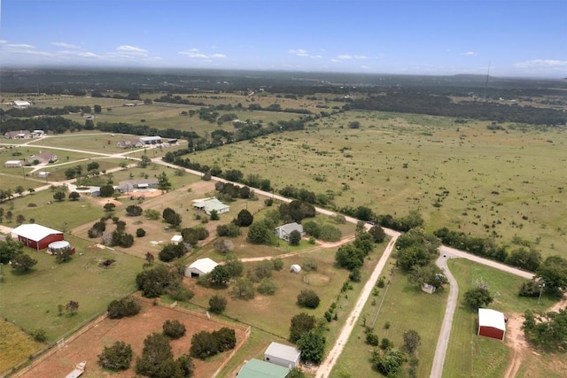 birds eye view of property featuring a rural view