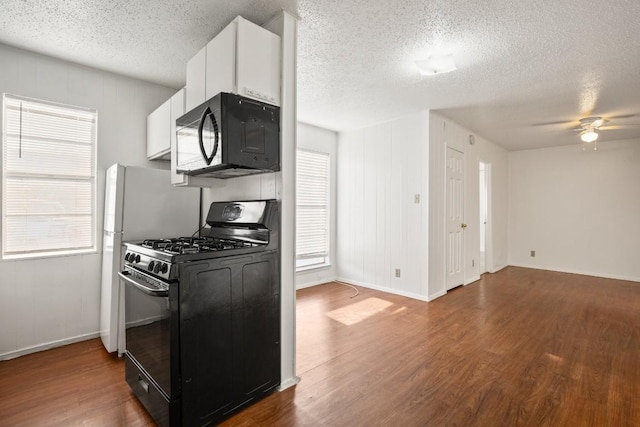 kitchen featuring white cabinetry, a textured ceiling, dark hardwood / wood-style flooring, ceiling fan, and black appliances