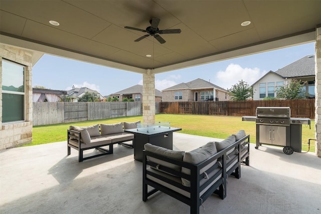 view of patio featuring a fenced backyard, outdoor lounge area, a ceiling fan, grilling area, and a residential view