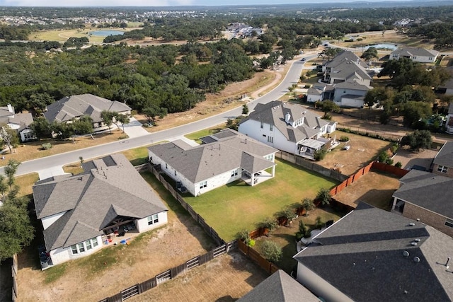 birds eye view of property with a residential view