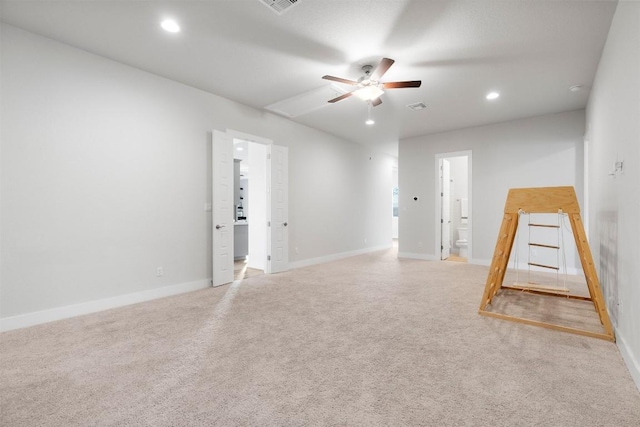 empty room with light carpet, baseboards, a ceiling fan, and recessed lighting