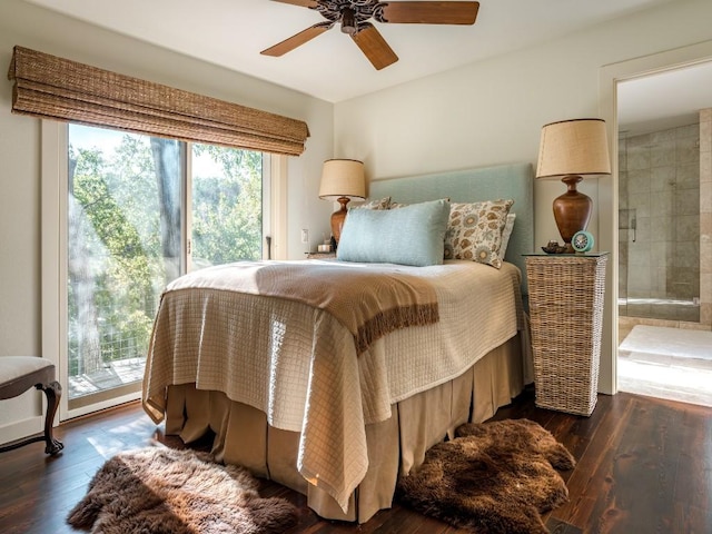 bedroom featuring dark wood-type flooring, access to outside, and ceiling fan