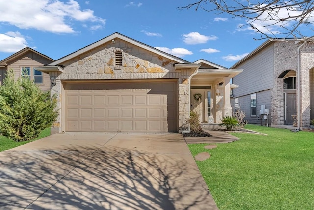 view of front of property featuring a garage and a front yard