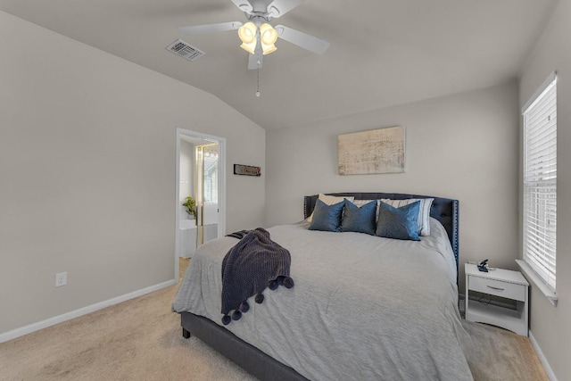 carpeted bedroom featuring vaulted ceiling and ceiling fan