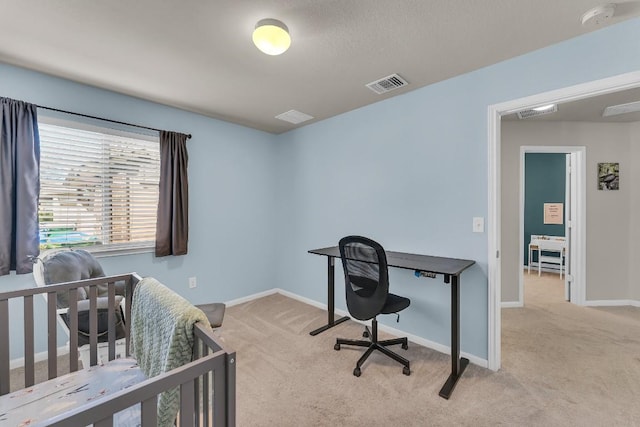 office space with light colored carpet