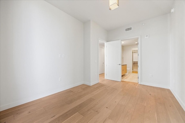 empty room featuring light hardwood / wood-style floors