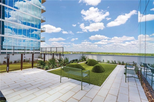 view of patio / terrace with a water view