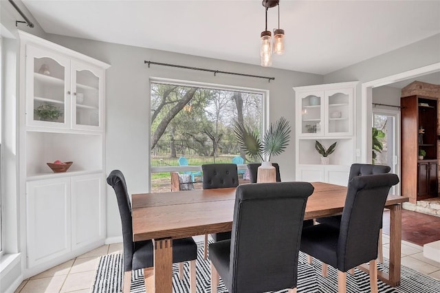 dining room featuring light tile patterned floors