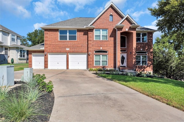 front facade with a garage and a front lawn