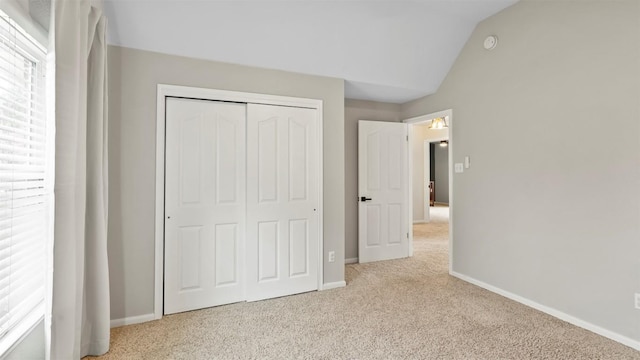 31108 La Quinta Dr, Georgetown, TX 78628 - unfurnished bedroom featuring carpet floors, a closet, and vaulted ceiling