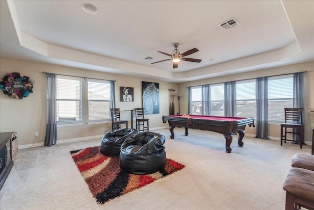 playroom with light carpet, pool table, and a raised ceiling