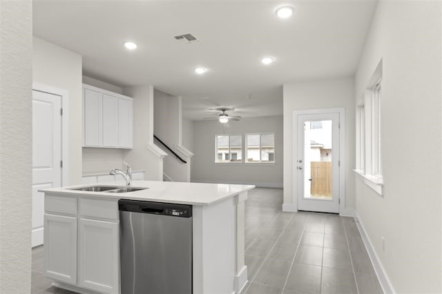 kitchen with sink, white cabinetry, a center island with sink, dishwasher, and ceiling fan