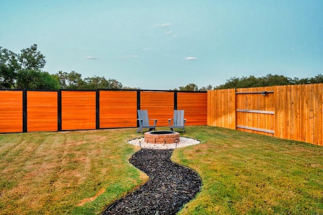 1632 Stone House, New Braunfels, TX 78132 - fenced backyard featuring an outdoor fire pit