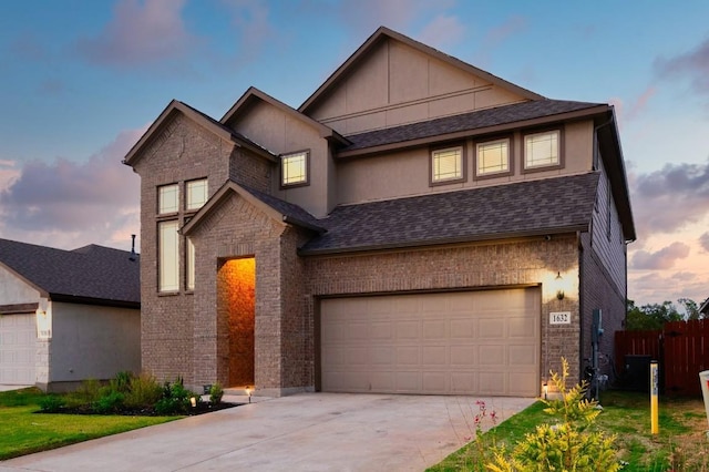 view of front of property with a garage