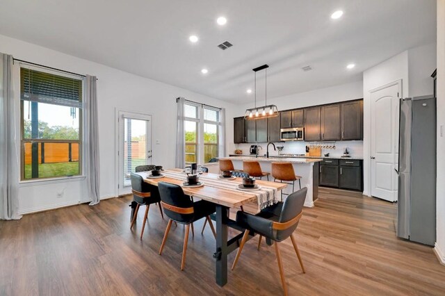 1632 Stone House, New Braunfels, TX 78132 - dining space with wood finished floors and recessed lighting