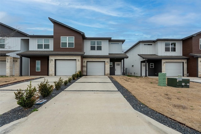 multi unit property featuring a garage