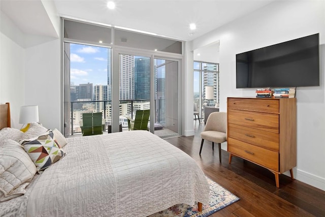 501 W Ave Unit 1403, Austin, TX 78701 - bedroom with access to exterior, dark wood-type flooring, and recessed lighting