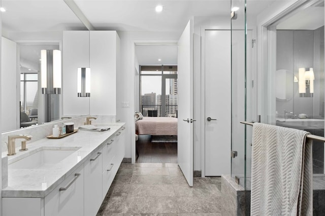 bathroom featuring vanity and walk in shower