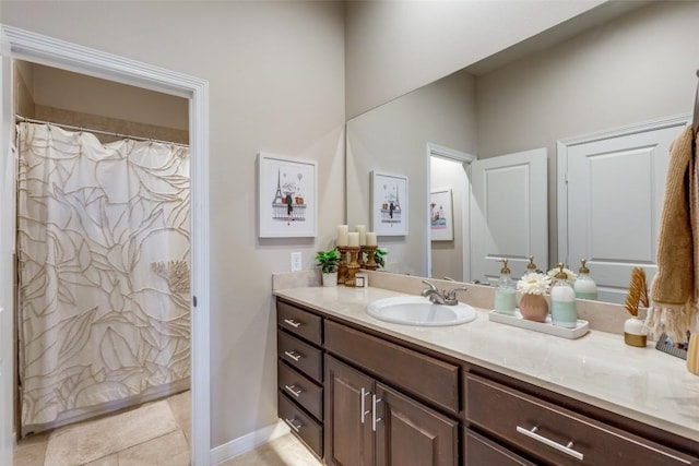 bathroom with vanity and tile patterned floors