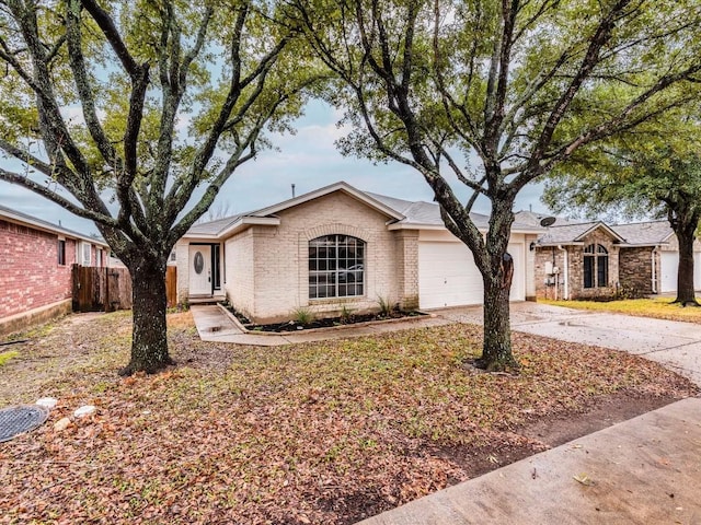 single story home with a garage