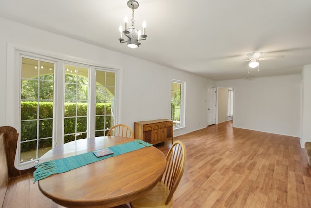 9304 Rock Way Dr, Austin, TX 78736 - dining area with a chandelier, light wood-style floors, and ceiling fan