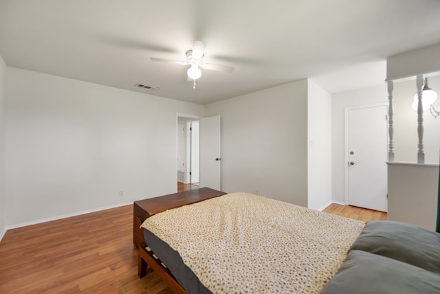 bedroom featuring ceiling fan and light hardwood / wood-style floors