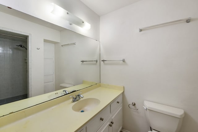 9304 Rock Way Dr, Austin, TX 78736 - full bath with toilet, a tile shower, and vanity