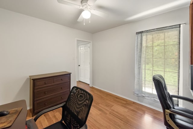 9304 Rock Way Dr, Austin, TX 78736 - office with light wood-style flooring, a ceiling fan, and baseboards