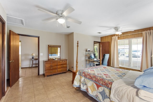 bedroom with light tile patterned floors and ceiling fan