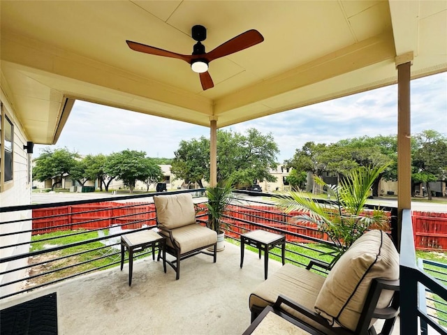 balcony featuring ceiling fan