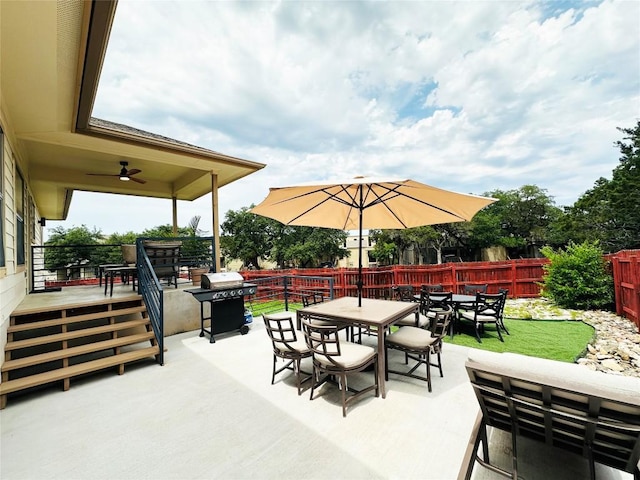 view of patio / terrace featuring ceiling fan, area for grilling, and an outdoor living space