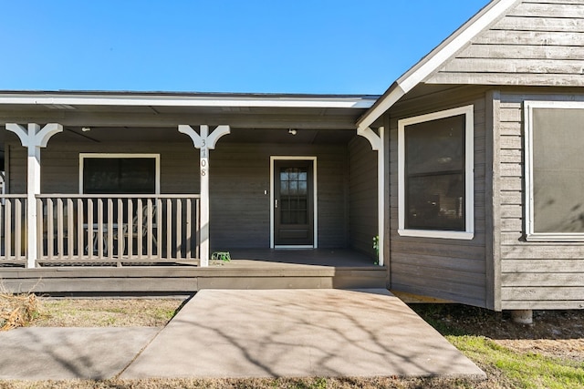 doorway to property with a porch