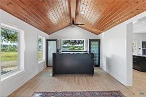 interior space with vaulted ceiling with beams, wood ceiling, and light wood-type flooring