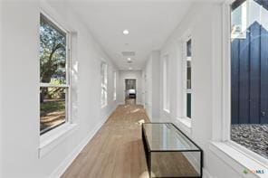 hallway featuring light hardwood / wood-style flooring