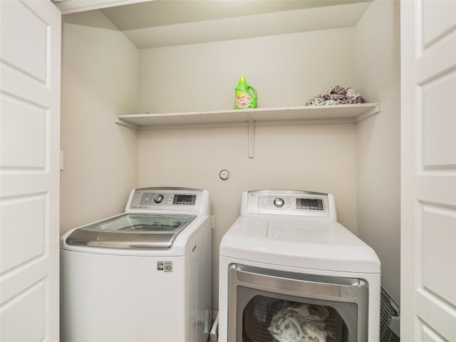 laundry area featuring washer and clothes dryer