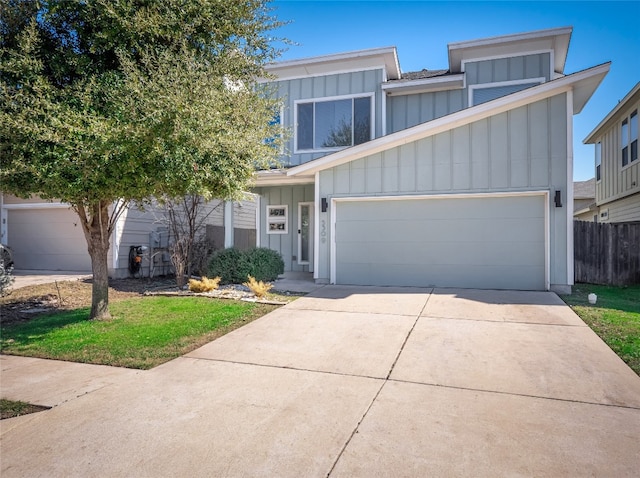 view of front facade featuring a garage and a front yard