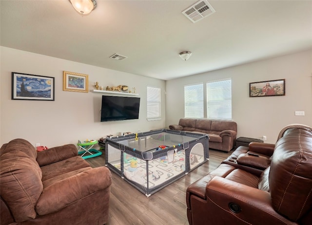 living room with hardwood / wood-style flooring