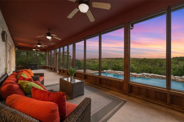 sunroom / solarium featuring a healthy amount of sunlight