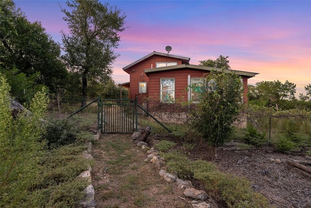 view of property exterior at dusk