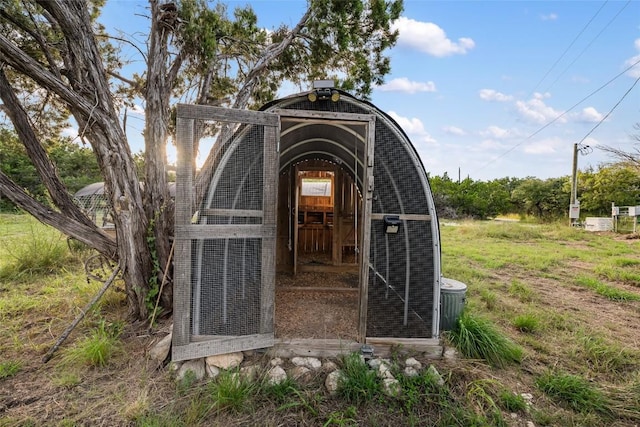 view of outbuilding featuring cooling unit