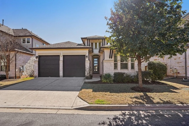 view of front of property featuring a garage