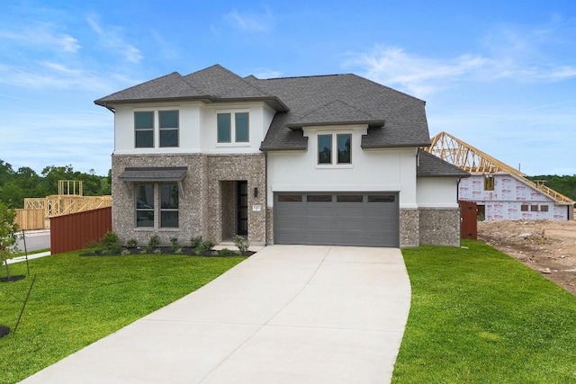 1243 Robin Trl, Round Rock, TX 78681 - view of front of property with stucco siding, concrete driveway, a shingled roof, and an attached garage