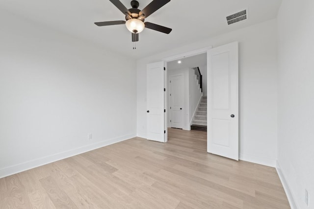 1243 Robin Trl, Round Rock, TX 78681 - unfurnished bedroom featuring baseboards, light wood finished floors, and a ceiling fan
