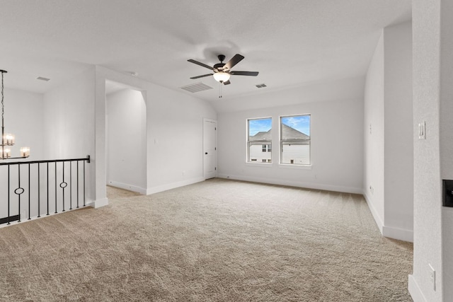 1243 Robin Trl, Round Rock, TX 78681 - unfurnished room with a chandelier, carpet flooring, and a ceiling fan