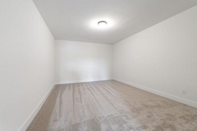 1243 Robin Trl, Round Rock, TX 78681 - unfurnished room featuring baseboards and carpet floors