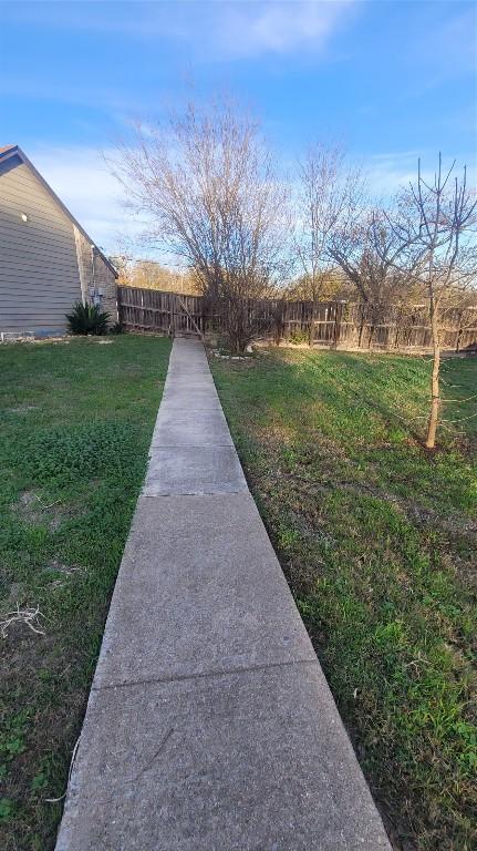 12410 Twin Creek Rd, Manchaca, TX 78652 - view of yard featuring fence